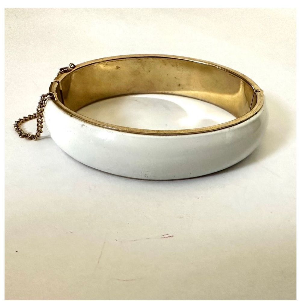White and gold tone bangle bracelet